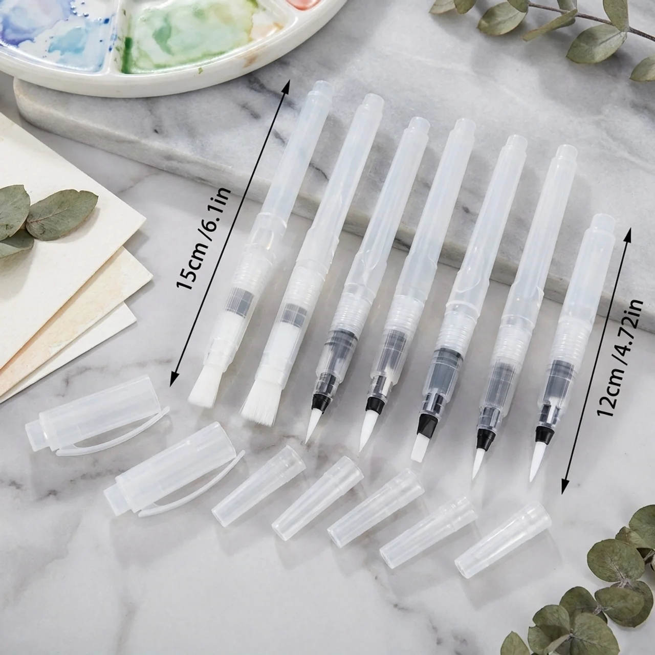 Aqua brush set in use — travel watercolor painting